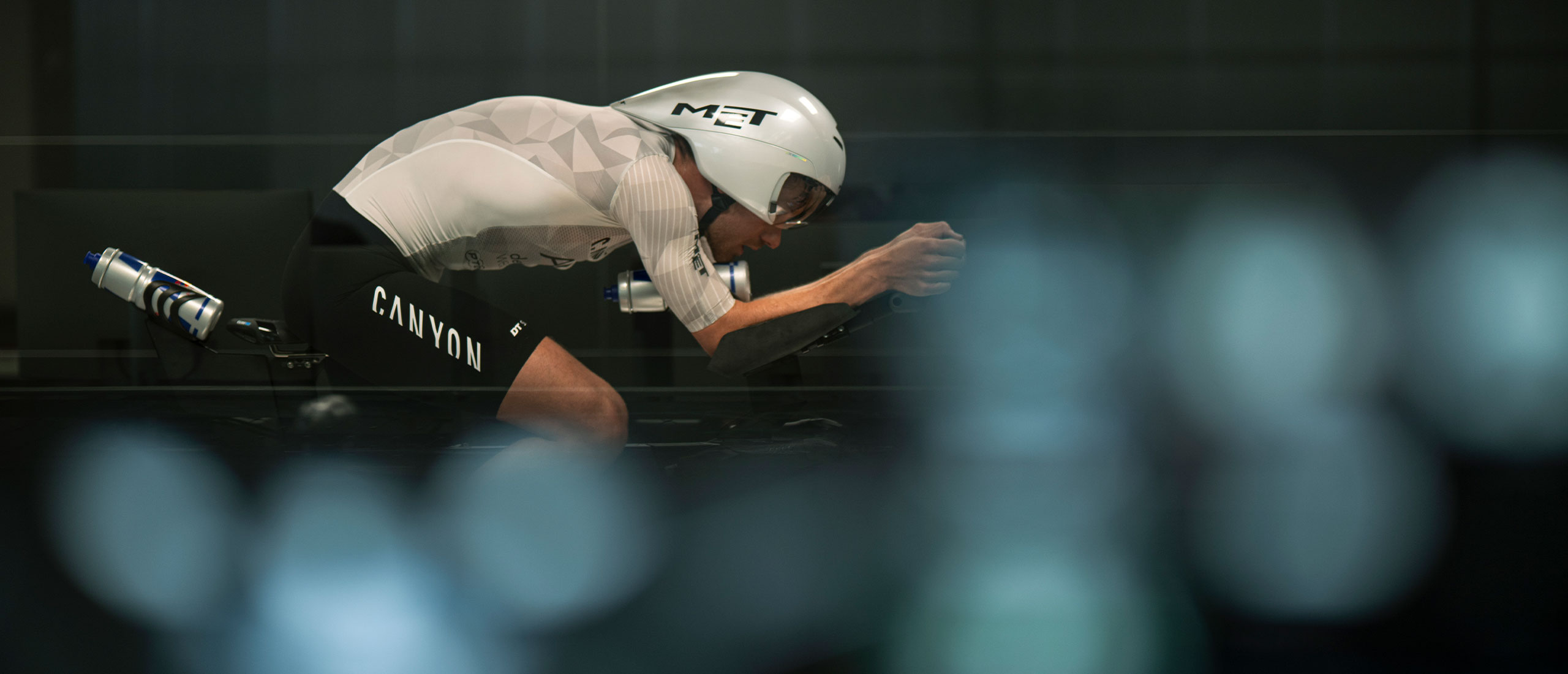 Daniel Bækkegård in time-trial position wearing the MET Drone Wide Body II aero helmet