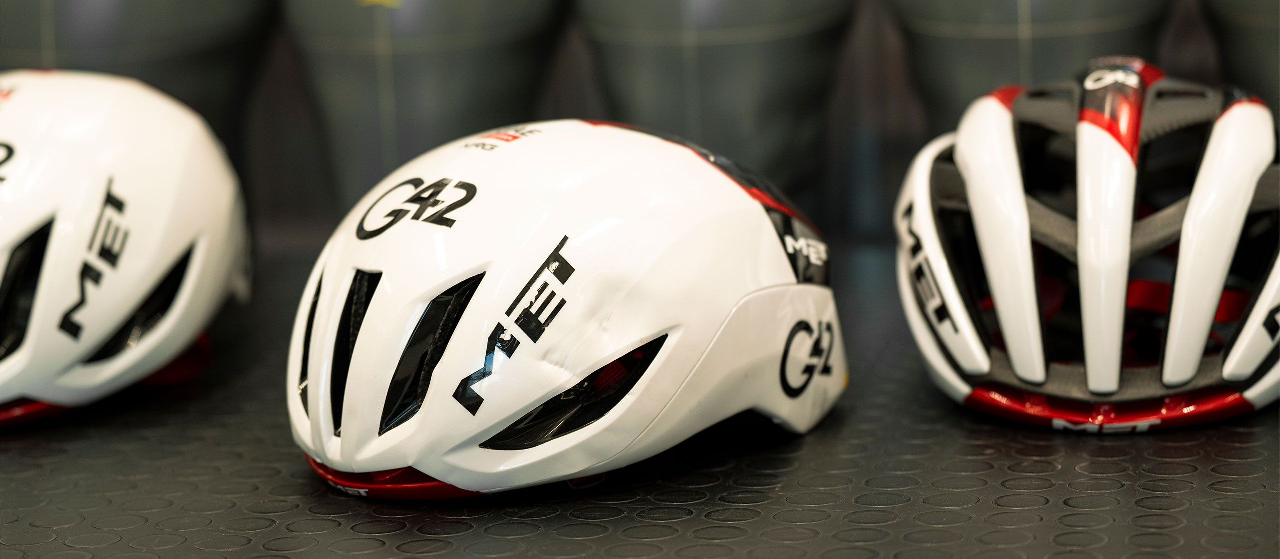 UAE Team Emirates Manta bike helmet with visible damage from a crash